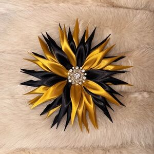 Elegant Gold and Black Floral Brooch